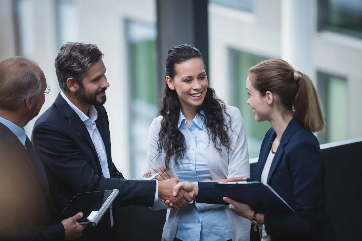 Recruitment partnership conversation in a modern office
